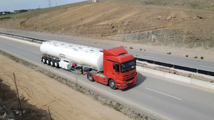 Elliptical Fuel Tanker 4 Axle Semi-trailer. Option: Aluminum body. Step Frame Tanker